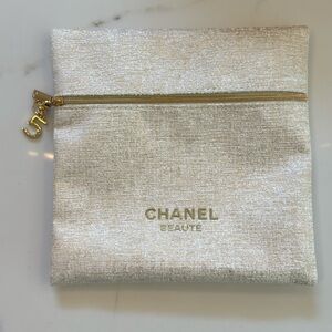 Chanel makeup bag w gold charm never been used